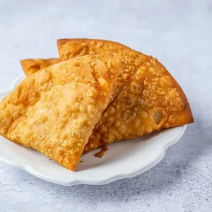 Golden and crispy homemade Meat Samosa filled with a spiced minced meat filling