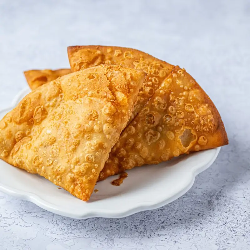 Golden and crispy homemade Meat Samosa filled with a spiced minced meat filling