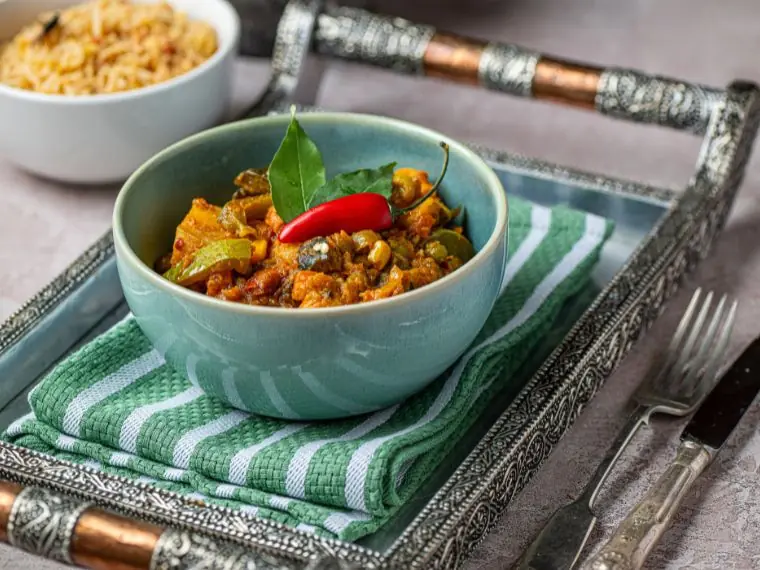 Authentic mixed vegetable masala curry topped with fresh red chilli and curry leaves | Alvi's Homemade